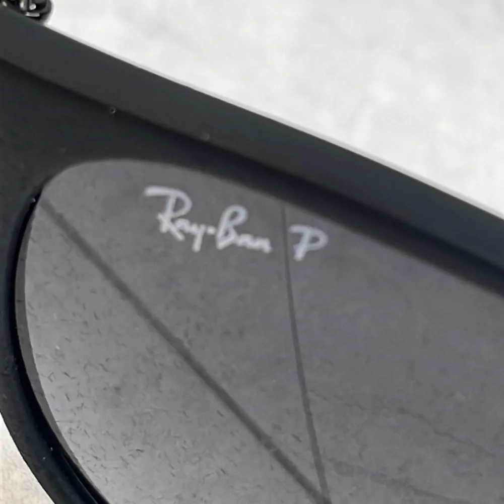 Ray-Ban Black Frame Polarized Sunglasses with Dark Gray Lenses